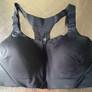 All in motion zip up black sports bra with adjustable straps size 34C NWT